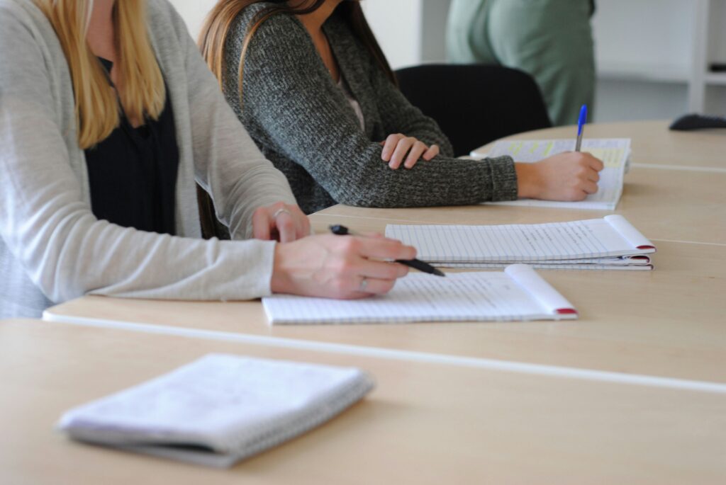 Taking notes at a meeting representing Life Chiropractic College West's College Advisory Council