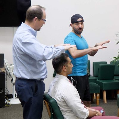 Students learning chiropractic technique as part of the Clinically Inspired Learning Curriculum at Life West